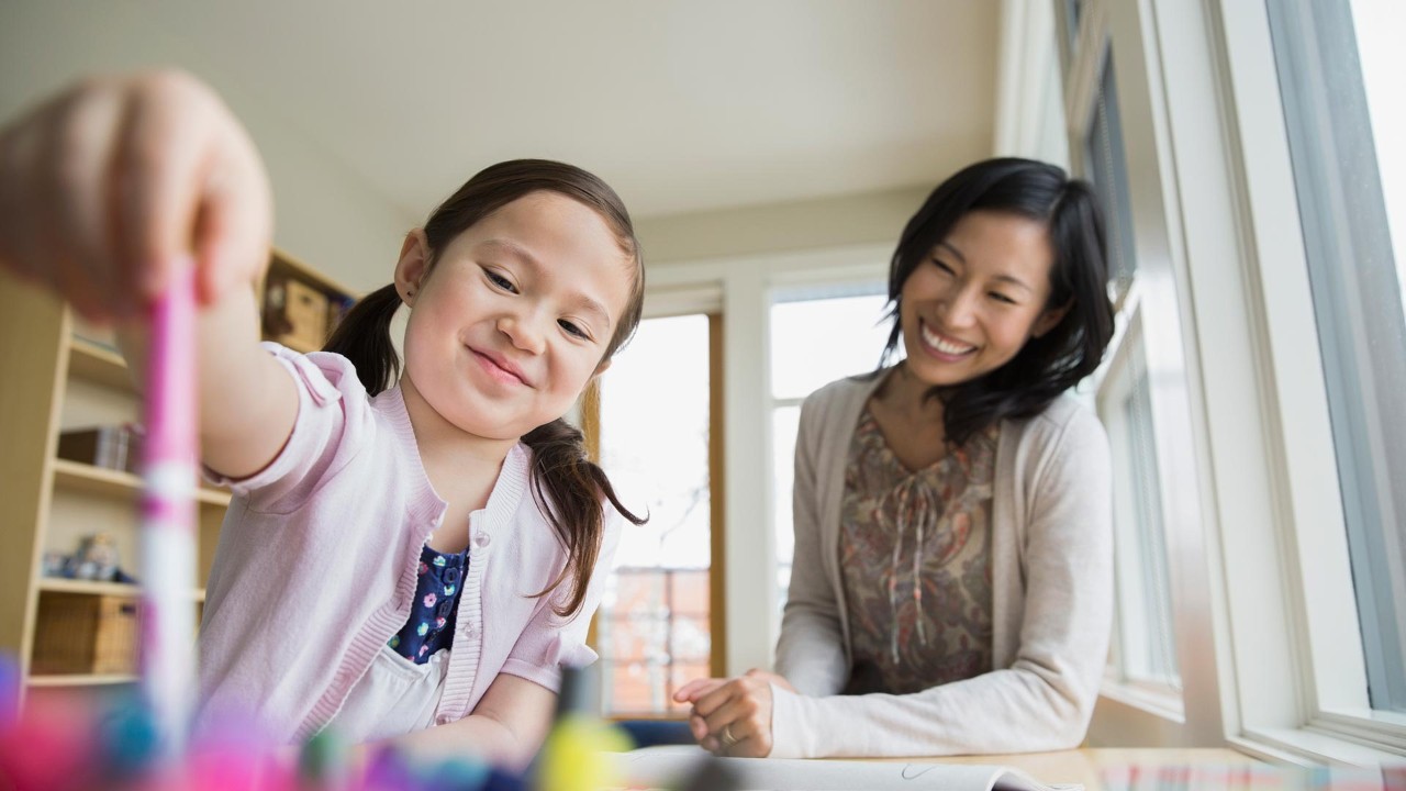 Mom and daughter are playing ; the image used for education planning - five questions to ask yourself