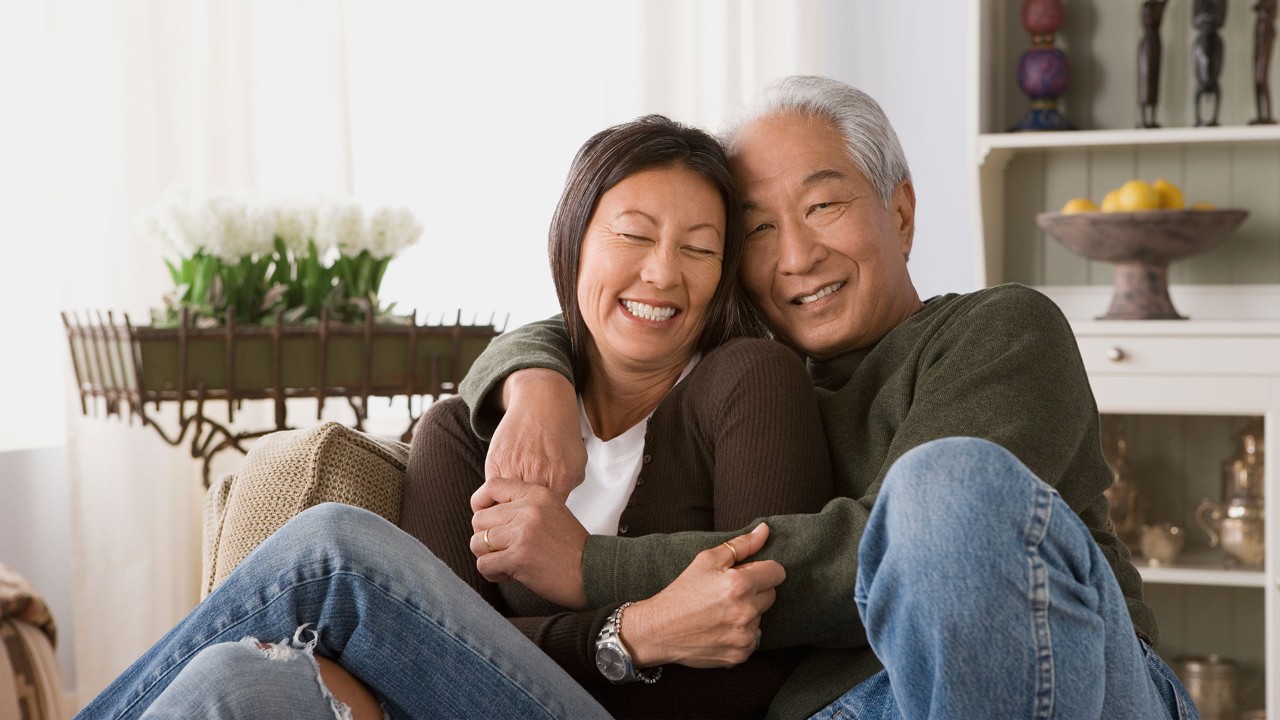 senior couple are hugging; the image used for wealth education