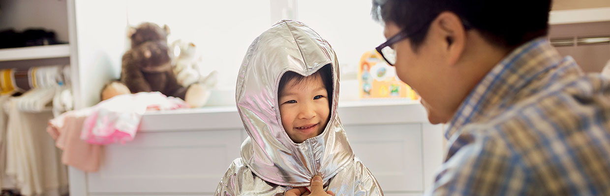father and son smile each other, used for HSBC advane
