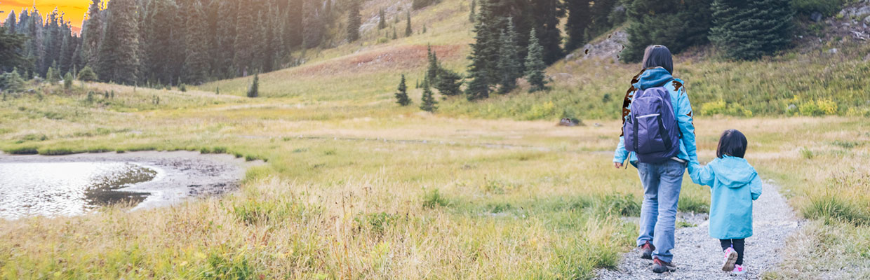 mother and daughter hiking,image is used for insurance