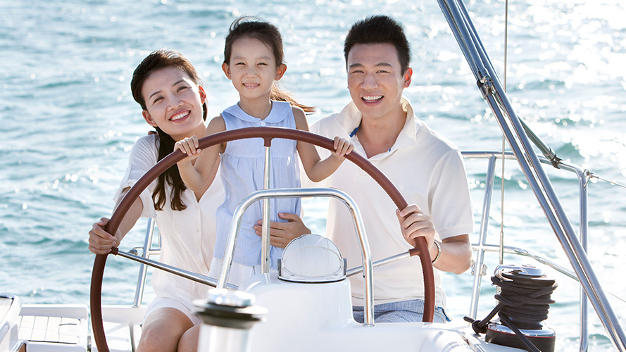 grandfather, father and son on the yacht,image is used for life insurance