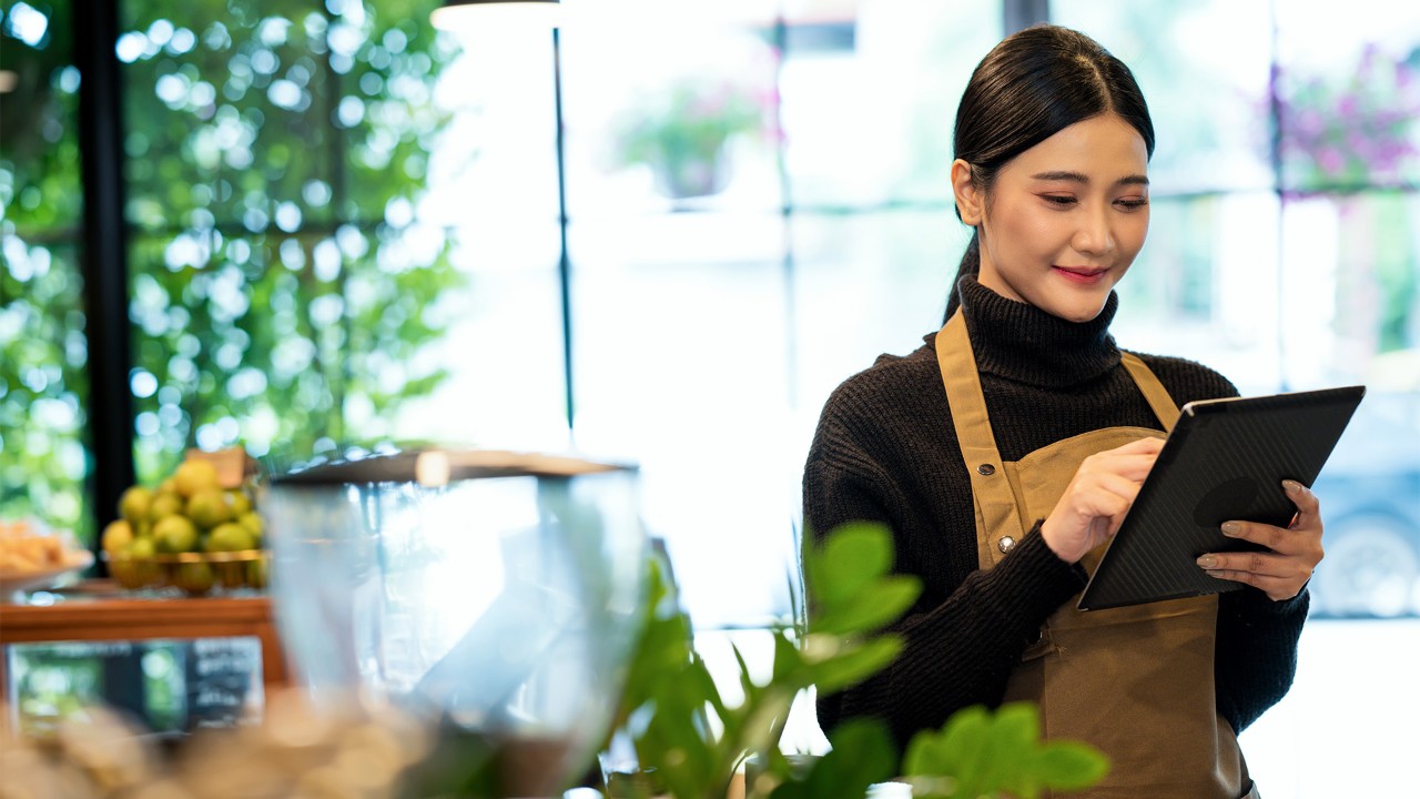 Girl looking at tablet; image used for avoid excessive borrowing