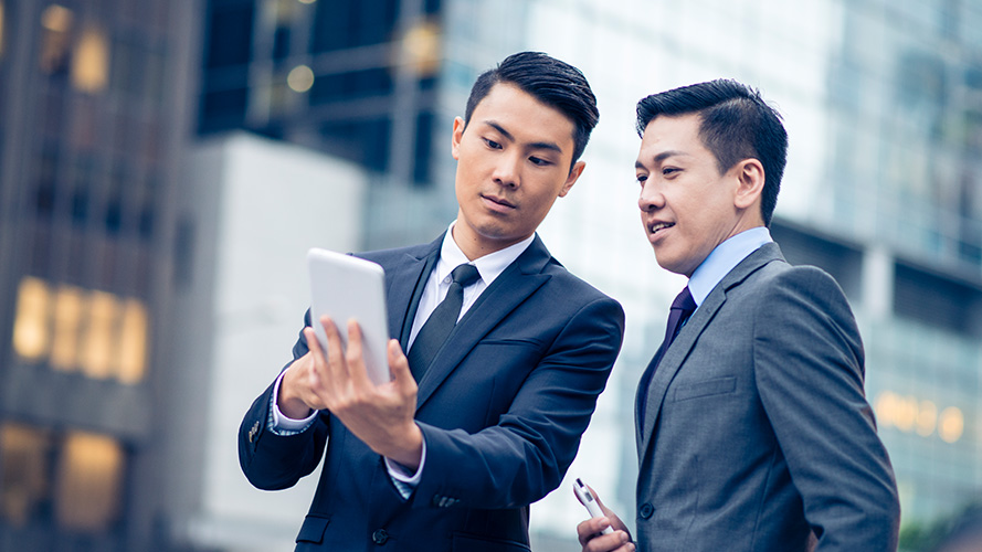 two men are discussing ; the image used for Local Unit Trust (Third Party)