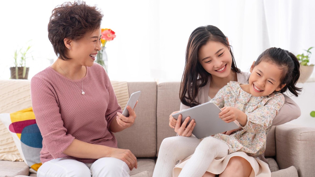 Three grandparents chatting on the sofa; the image used for why saving is important