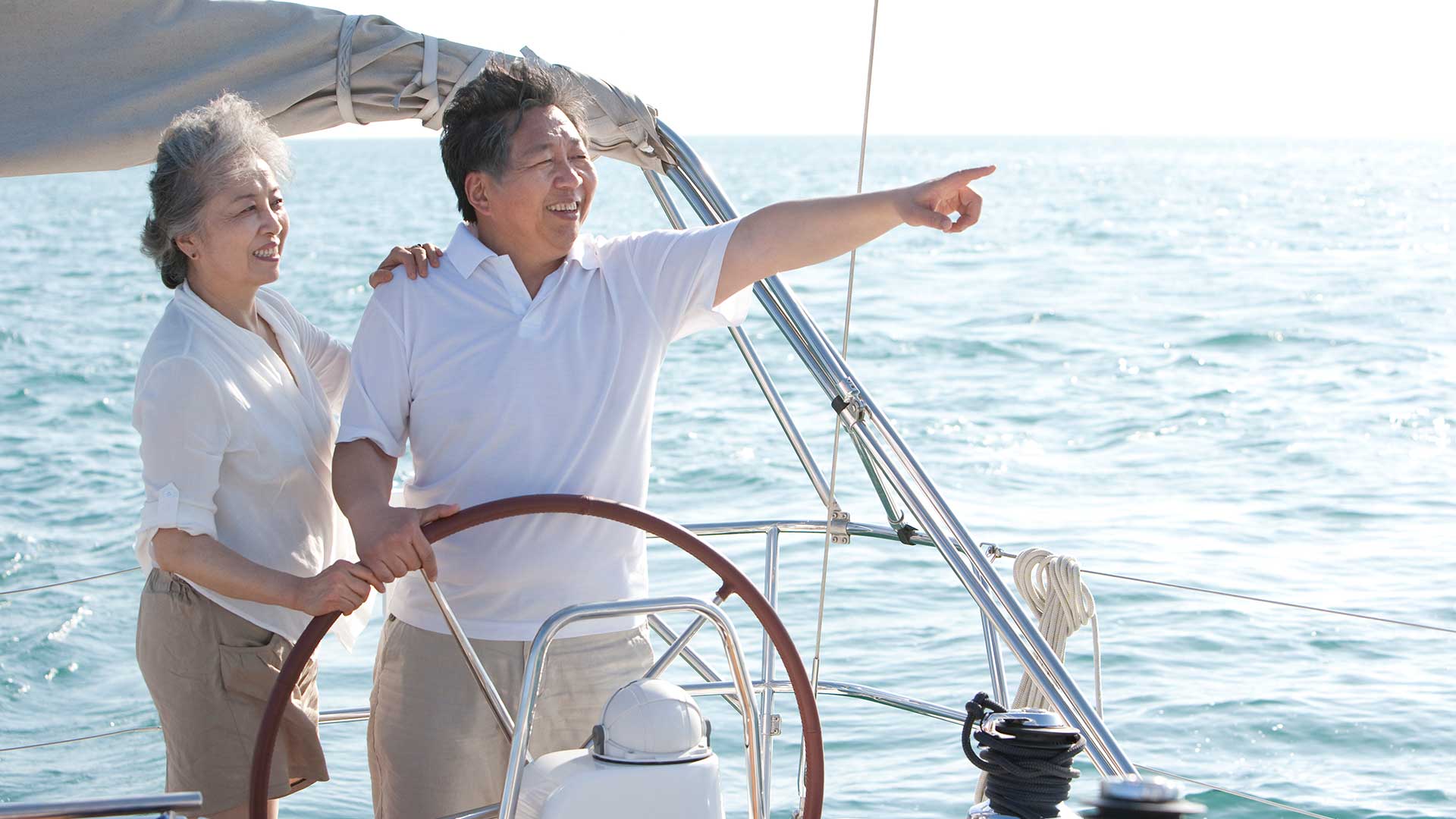senior couple go walk at the seaside; the image used for wealth legacy page