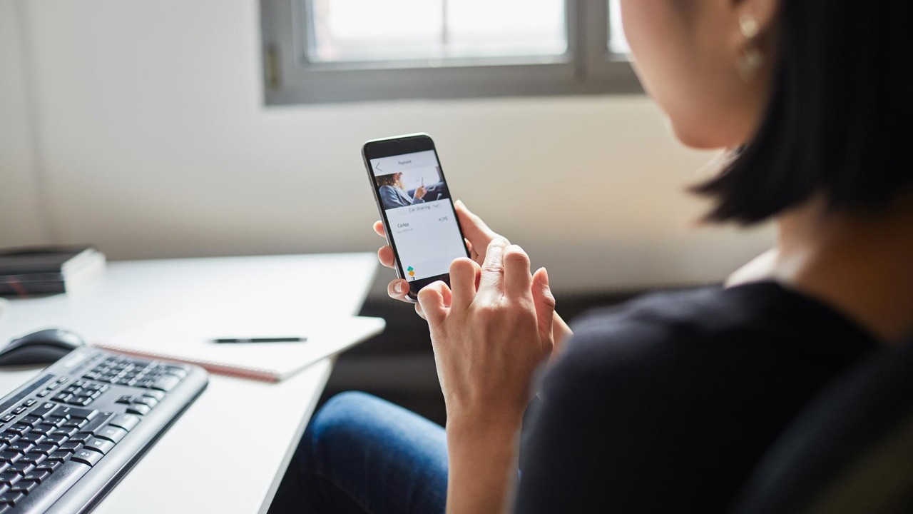 girls who use mobile phones to query information; the image used for phone banking