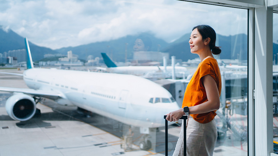 the lady storing luggage, the image used for Foreign currency solutions